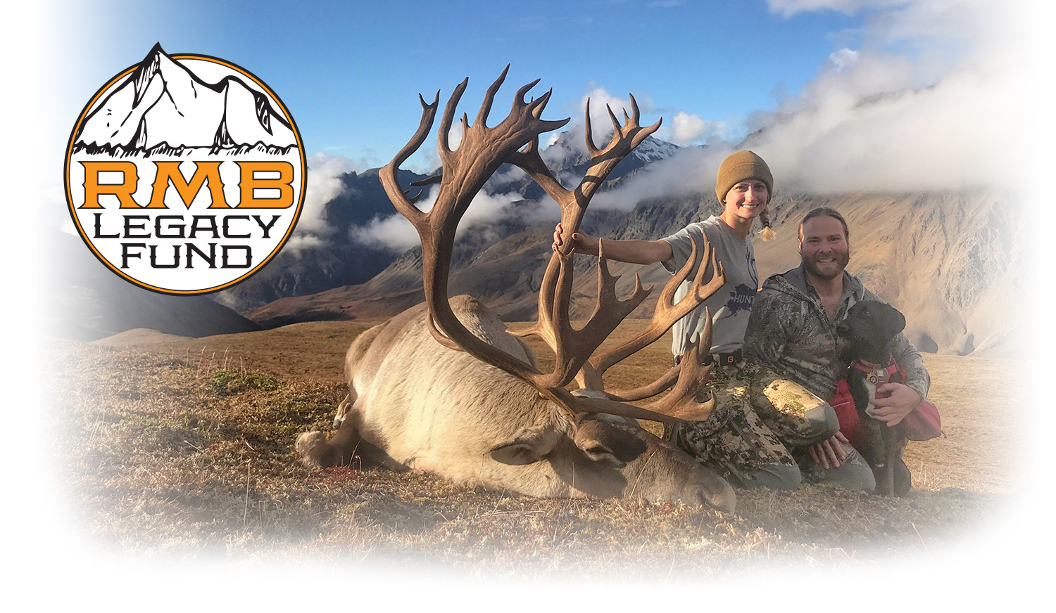 Rubye and Blake with a caribou